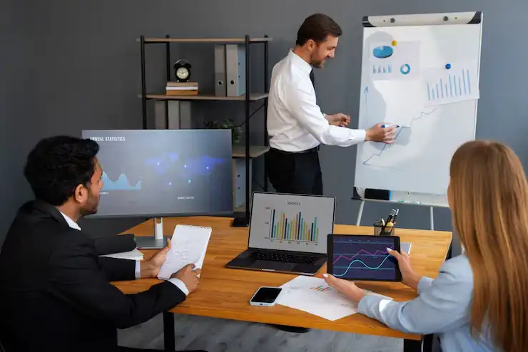 business-person-looking-finance-graphs_23-2150461328