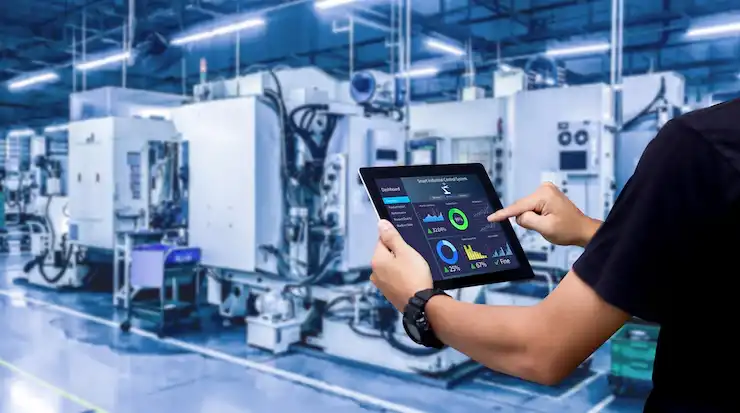smart-industry-control-concepthands-holding-tablet-blurred-automation-machine-as-background_12892-104